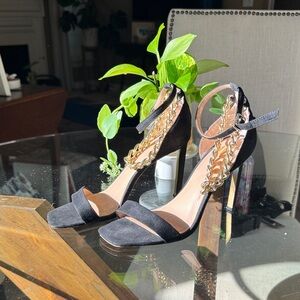 Jennifer Lopez Black and Gold Chain Heels